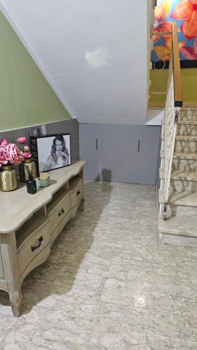 TV a/nebo společenská místnost v ubytování B&B Eterea