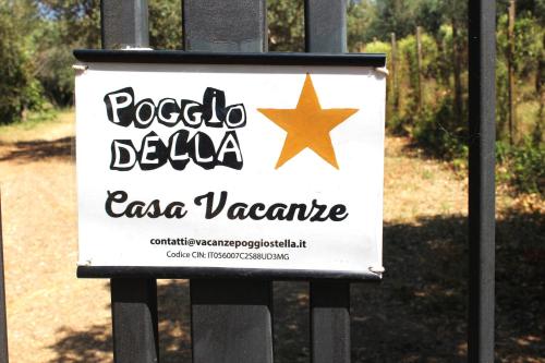 a sign on a fence that reads roccazonazona at Poggio della Stella in Blera