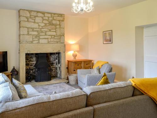 Et opholdsområde på Sheilas Cottage