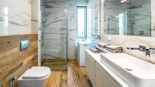 Kúpeľňa v ubytovaní Apartamenty Stranda Residence nad jeziorem Mazury Holiday