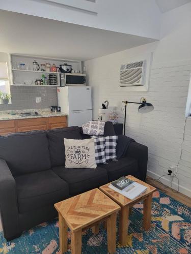 a living room with a couch and a coffee table at Cozy Cabin, near Mosier and Hood River in Mosier