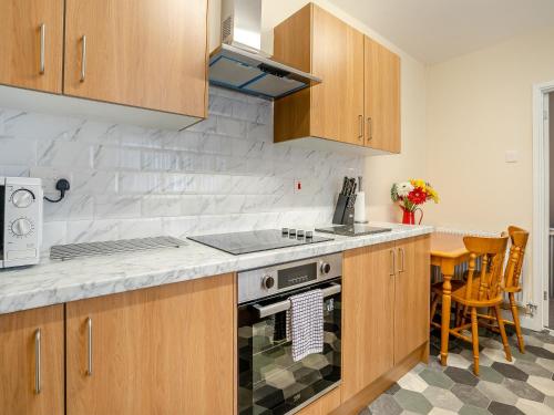 Kuchyň nebo kuchyňský kout v ubytování Lime House