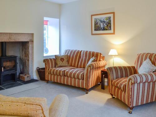 Χώρος καθιστικού στο Dairy Cottage