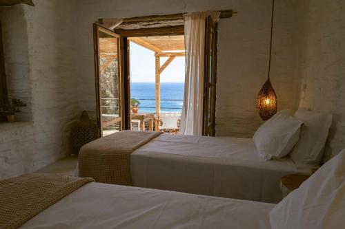 Ένα ή περισσότερα κρεβάτια σε δωμάτιο στο Kea Retreat