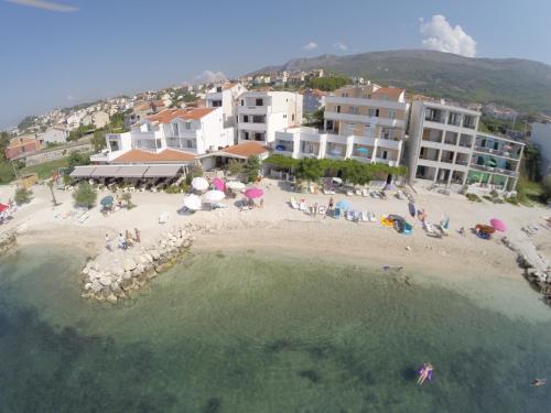an aerial view of a beach with a group of people at Villa Amigo in Podstrana