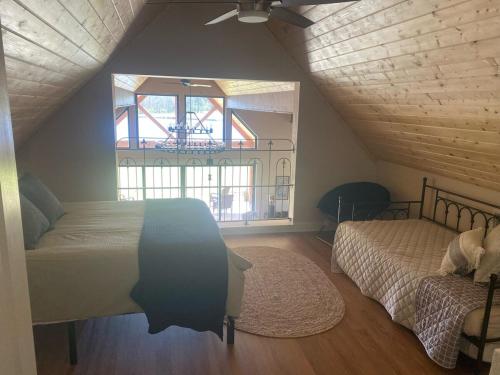 Кровать или кровати в номере Luxurious, Spacious Blue Heron - 5 Bedrooms - Ruston LA