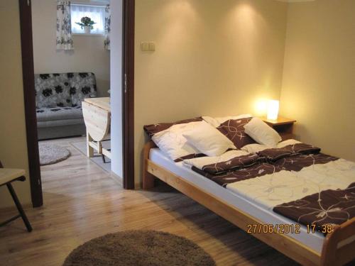 A bed or beds in a room at Willa Apollo