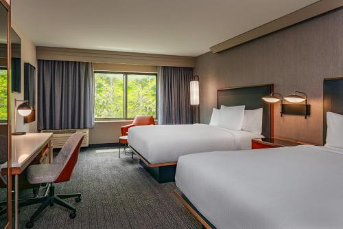 Courtyard by Marriott Oneontaにあるベッド