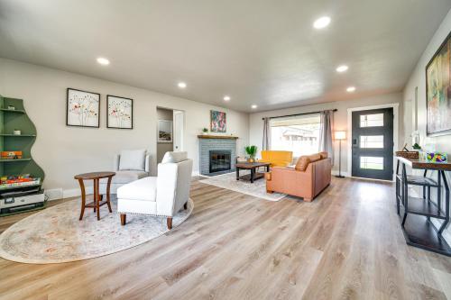 a living room with furniture and a fireplace at 3 Mi to Dtwn Family Home with Garden and EV Charger in Yakima