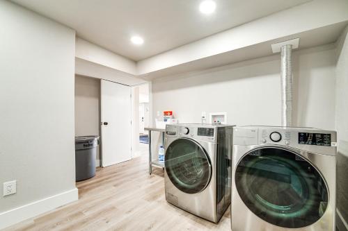 a laundry room with a washer and dryer at 3 Mi to Dtwn Family Home with Garden and EV Charger in Yakima