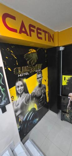 a sign on the wall of a gym at CLUB 33 FIT Hotel Gym in Huancayo
