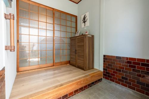 Fotografie z fotogalerie ubytování 一棟貸切宿 Shiyon, 60-year-old renovated private house v destinaci Marugame