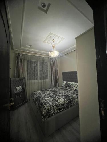 Postel nebo postele na pokoji v ubytování Tanger City Nest Residance