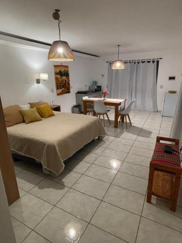 Ένα ή περισσότερα κρεβάτια σε δωμάτιο στο La carolina