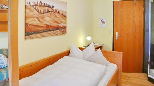 Cama o camas de una habitación en Gästehaus Kaiser