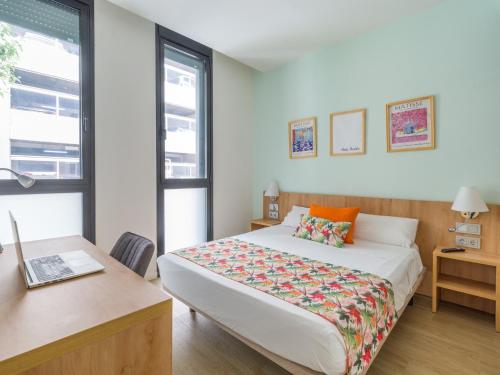 Ένα ή περισσότερα κρεβάτια σε δωμάτιο στο Apartment in Las Palmas by Las Canteras Beach