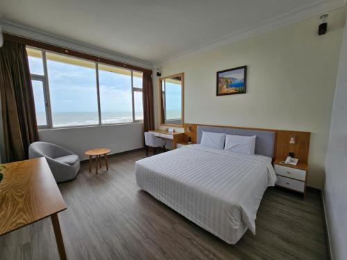 Ένα ή περισσότερα κρεβάτια σε δωμάτιο στο Sammy Hotel