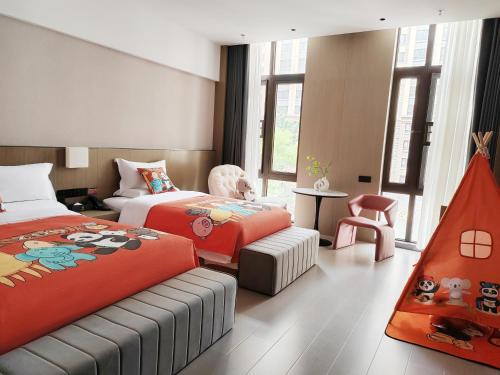 Postel nebo postele na pokoji v ubytování Beijing Suiyu Hotel