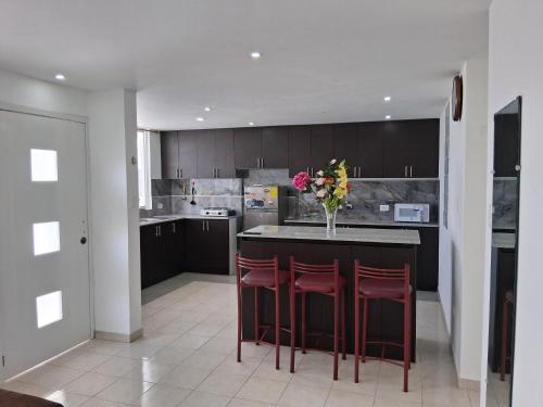 Gallery image of Residence FasMin B&B Nayon experience boxing in Quito