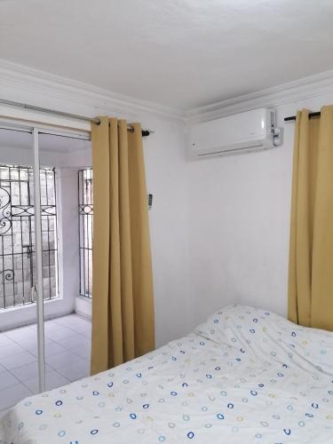 Ένα ή περισσότερα κρεβάτια σε δωμάτιο στο Studio Apartment 5 - SML Garden