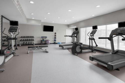 a gym with treadmills and ellipticals in a room at Residence Inn by Marriott Houston West/Beltway 8 at Clay Road in Houston