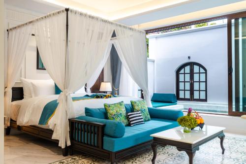 Un pat sau paturi într-o cameră la Siri Villa Chiang Mai