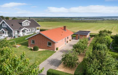 an aerial view of a home with an orange roof at 3 Bedroom Cozy Home In Tarm in Tarm