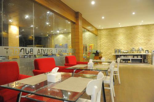 Zona de estar de Sylvia Hotel Budget