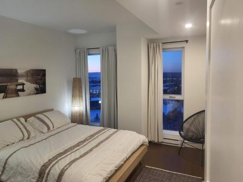 Postel nebo postele na pokoji v ubytování Practical Comfortable Condo Panoramic View 10th