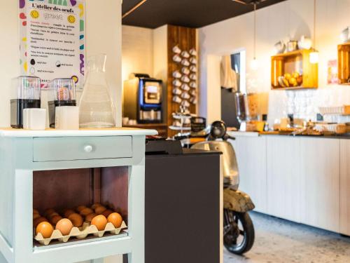Kuchyň nebo kuchyňský kout v ubytování Greet Hotel Limoges Nord