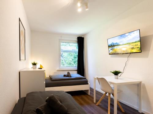 Postel nebo postele na pokoji v ubytování Nice Apartment Marl