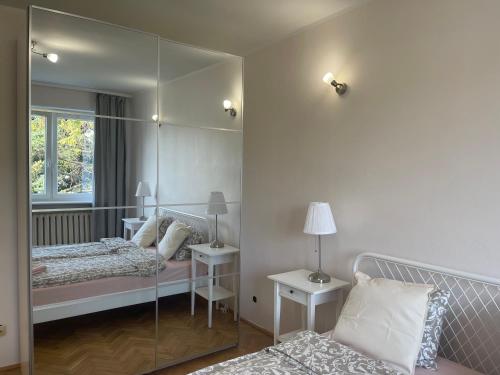 Posteľ alebo postele v izbe v ubytovaní Apartamenty Przy Plaży Gdynia Orłowo