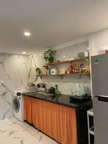 Kuchyň nebo kuchyňský kout v ubytování ẨN HOME n COFFEE