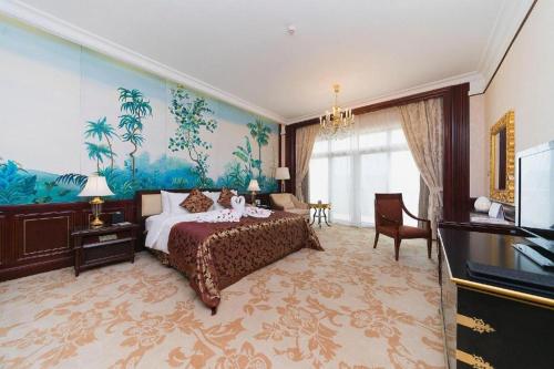 a hotel room with a bed and a large window at Evergrande Hotel Guangzhou Zengcheng in Zhongxin