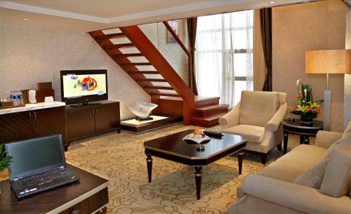 TV a/nebo společenská místnost v ubytování Best Western Premier Hotel Hefei