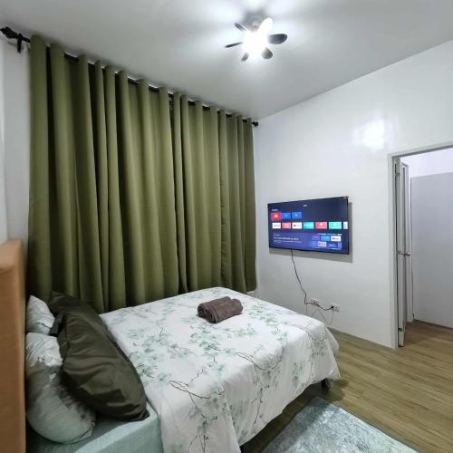 Postel nebo postele na pokoji v ubytování Davao City Airport Transient Rooms by Lemonique