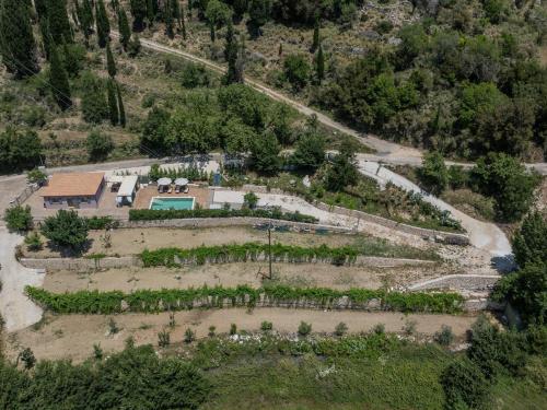 an aerial view of a garden with plants at Mater Terra-Private Villa in Sami
