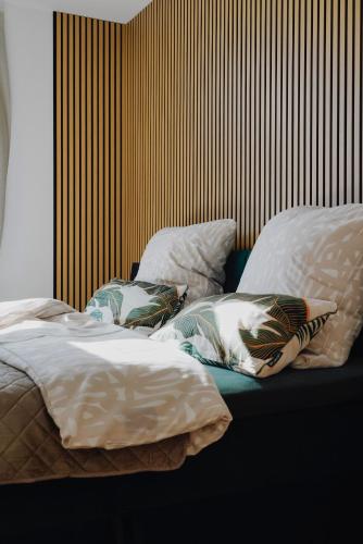 two beds with pillows sitting on top at Sonnenberg Domizil in Chemnitz