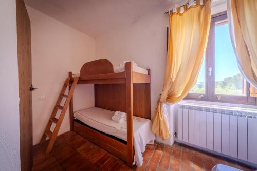 Katil atau katil-katil dalam bilik di Agriturismo Dai Du Bourdei