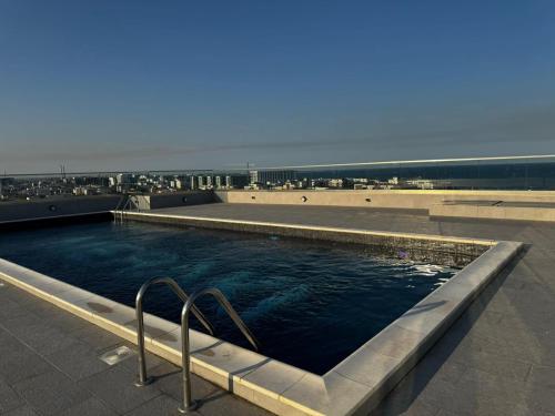Bazén v ubytování Iris by Meraki Resort & Spa nebo v jeho okolí