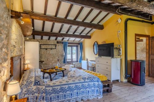 Katil atau katil-katil dalam bilik di Agriturismo Dai Du Bourdei