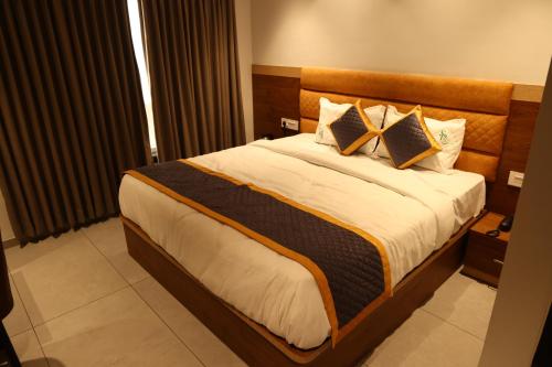 Ένα ή περισσότερα κρεβάτια σε δωμάτιο στο hotel SERENE PRAIA
