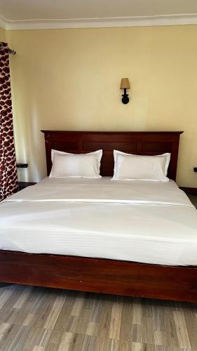Karibu guest house sipiにあるベッド