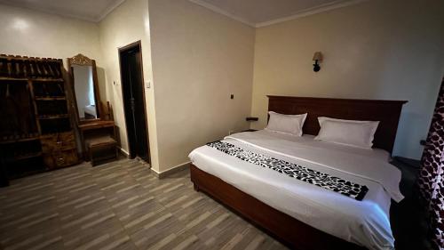 Karibu guest house sipiにあるベッド