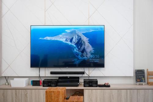 TV a/nebo společenská místnost v ubytování 小禾山居Danny's Home & 小艾山青I's Home