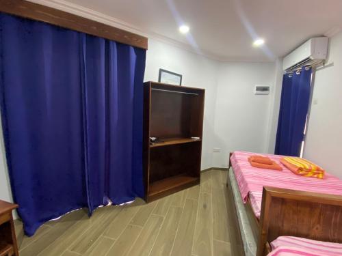 TV a/nebo společenská místnost v ubytování Sliema - Double Room