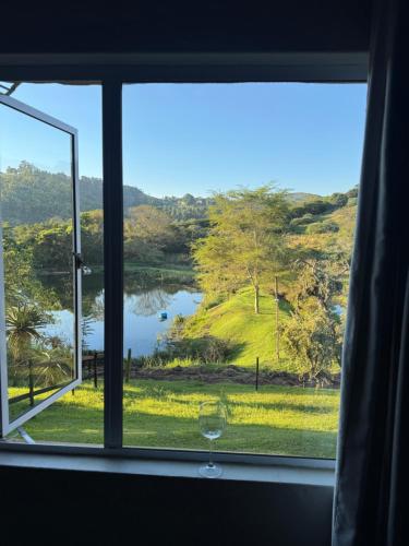a window with a view of a lake at Nampaton Farm in Drummond