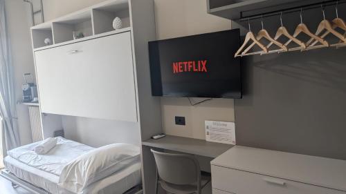 Postel nebo postele na pokoji v ubytování Hotel Novara
