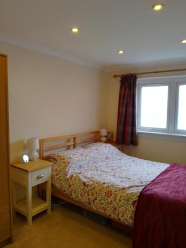 Ένα ή περισσότερα κρεβάτια σε δωμάτιο στο Comfortable room with en suite