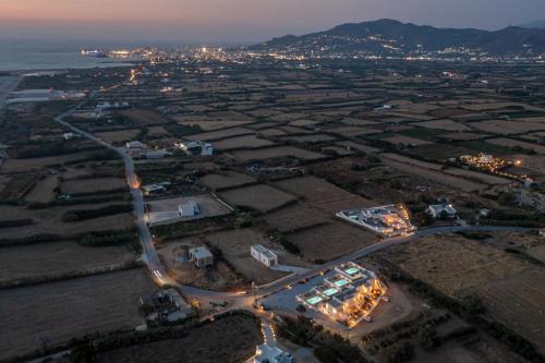 an aerial view of a city at night at White Cocoon Exclusive villas in Naxos Chora